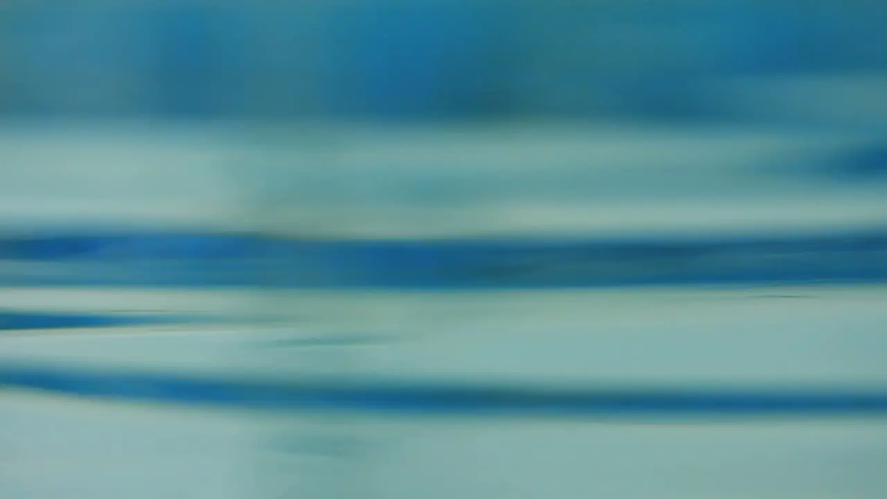 Abstract water background Blue water wave Closeup of smooth water surface