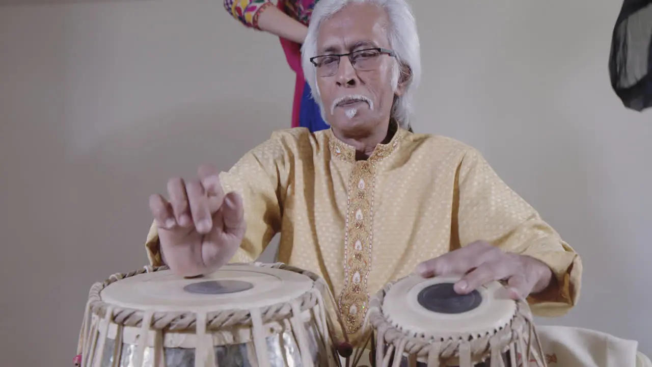 Indian Percussion Musician with Dancers 03