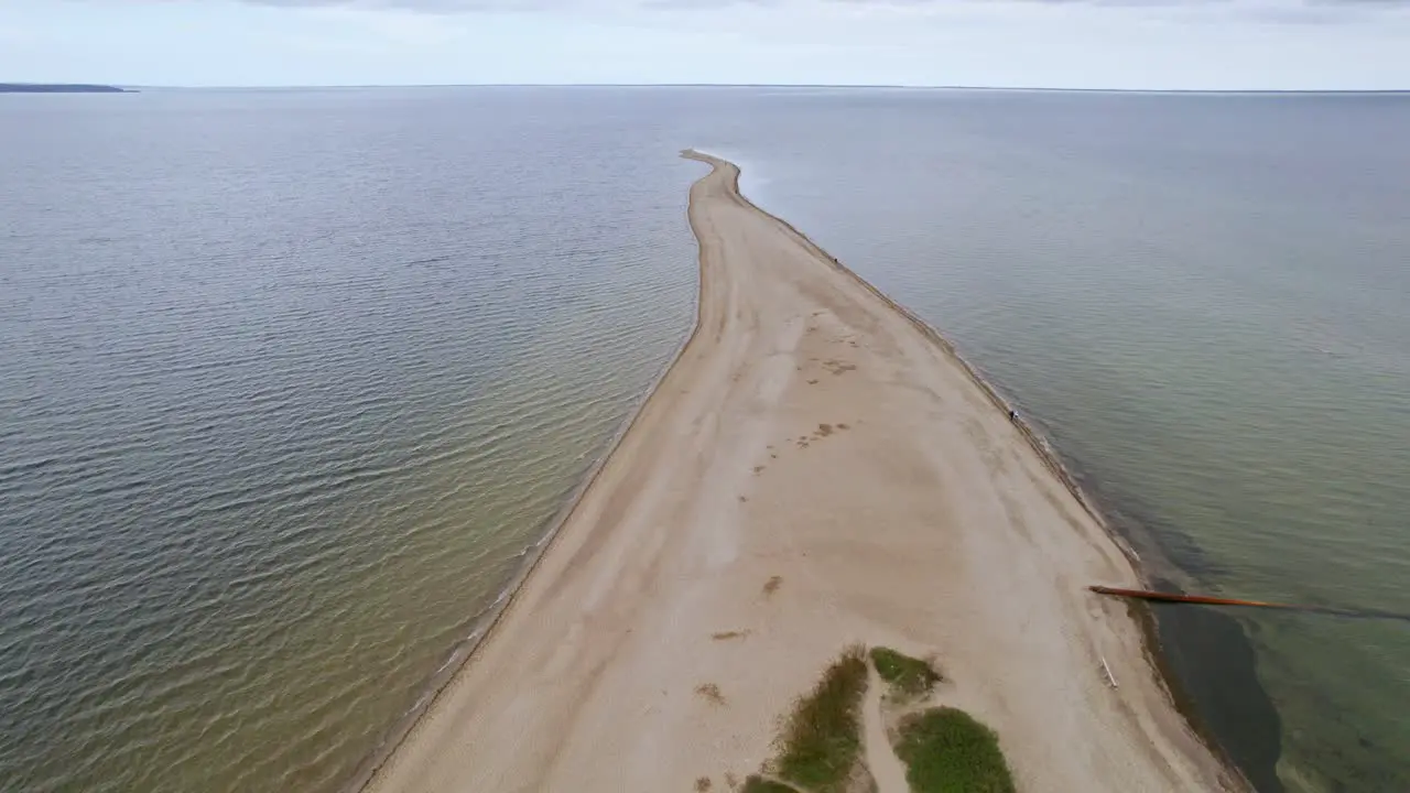 Revealing aerial shot of headland in Rewa Poland