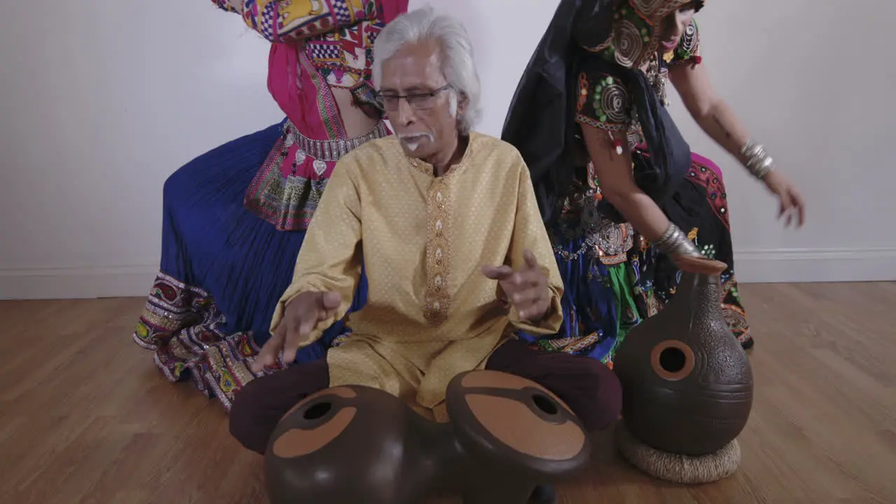 Indian Percussion Musician with Dancers 08