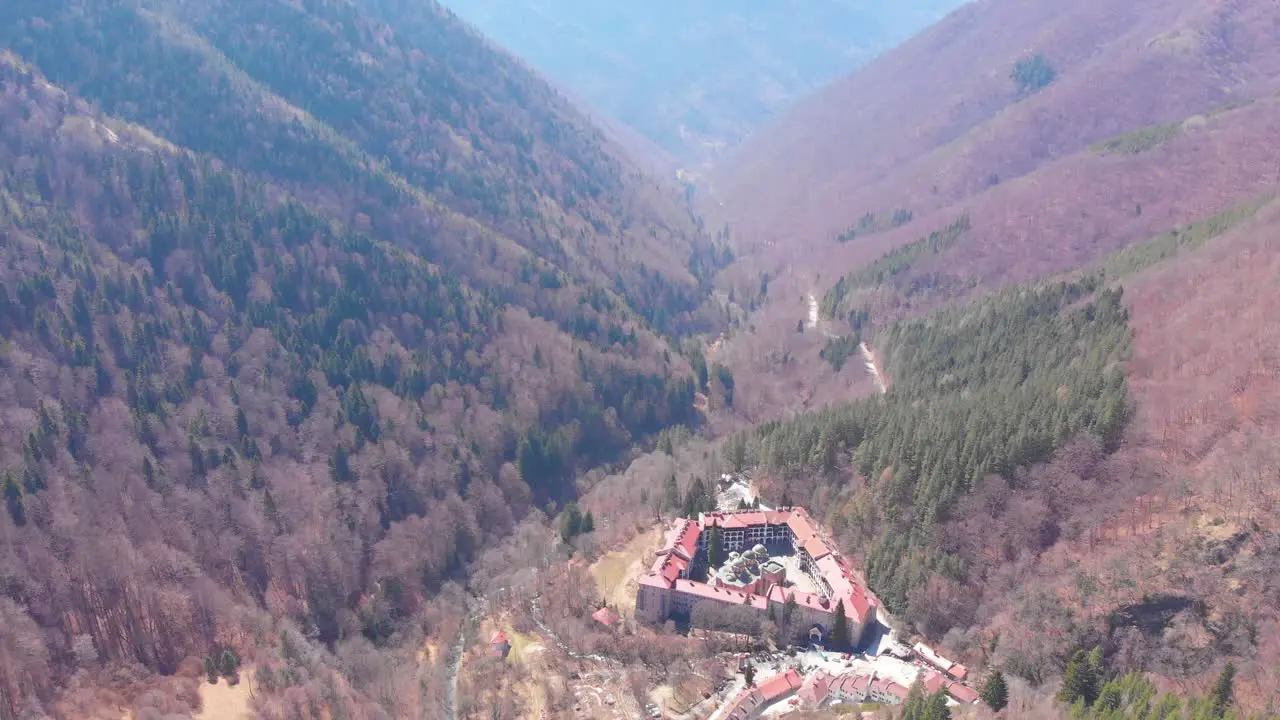 Flying above Rila Monastery valley during spring