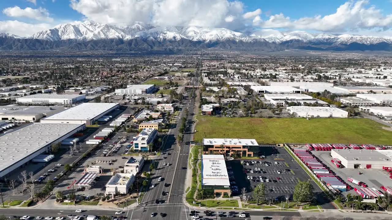 Ontario town in California with mountains on the background and big clouds