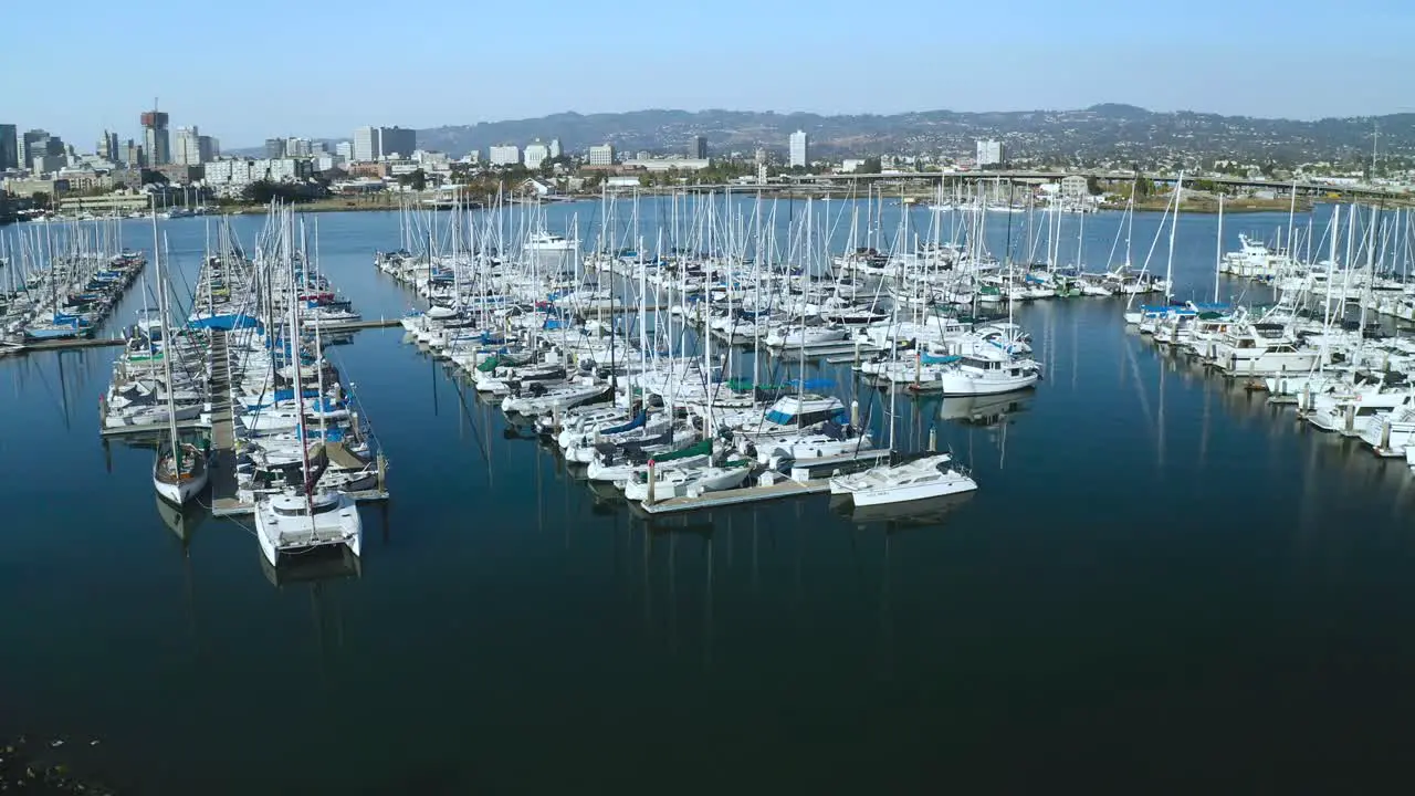 High over the port the boats slowly sway in the light breeze