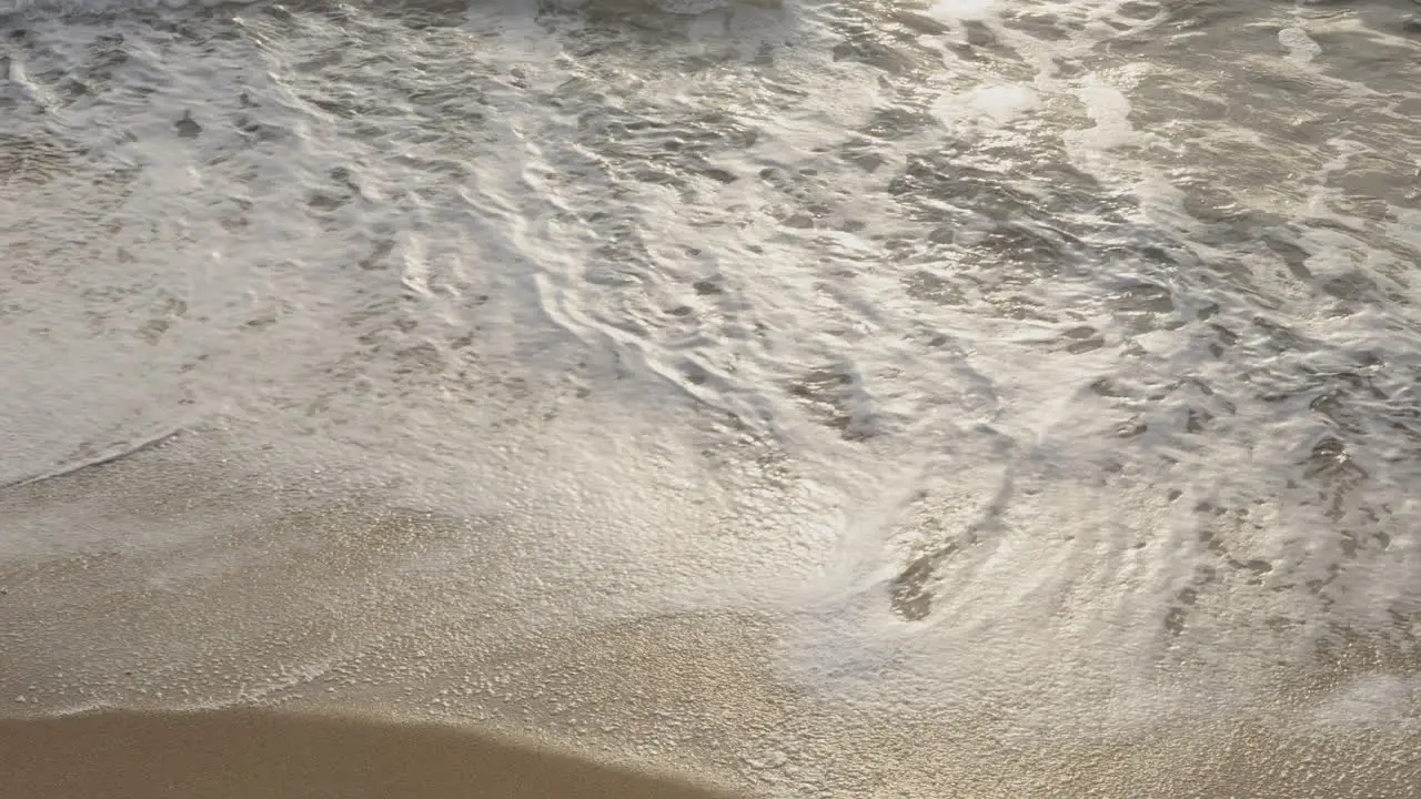 Sea waves on the shore during the evening in Portugal