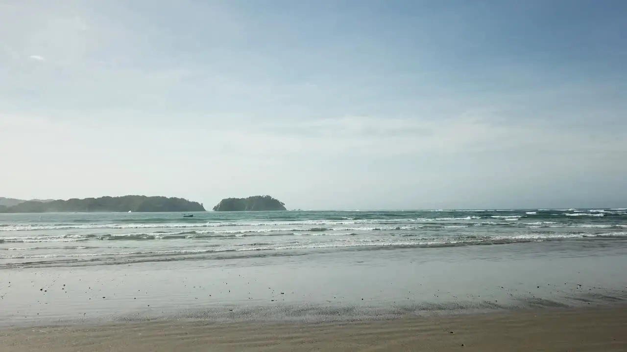 A fly over of a bike parked on the beach