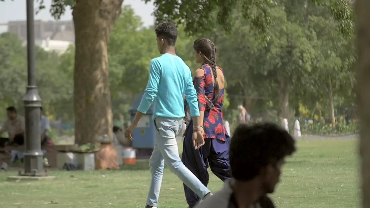 Couple walking through a Park