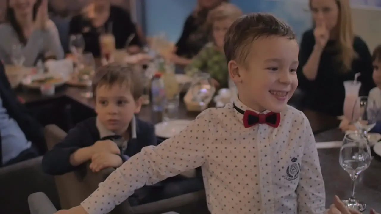 Child receiving congratulations on his birthday