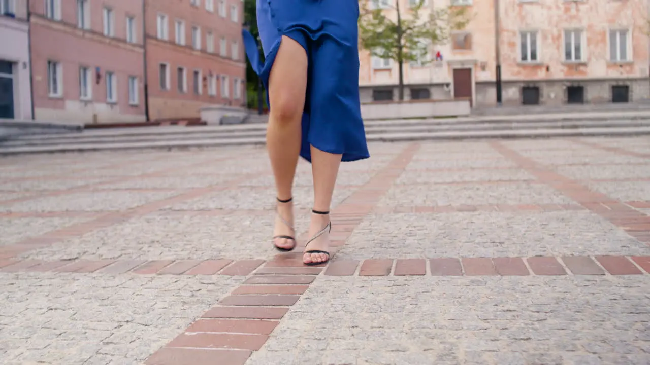 Happy Woman Dancing Alone In A Public Square