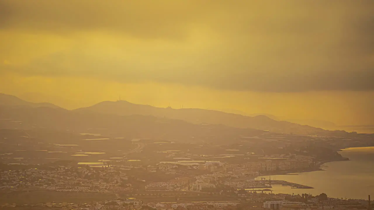 Misty Timelapse of Changing Sky Over Malaga