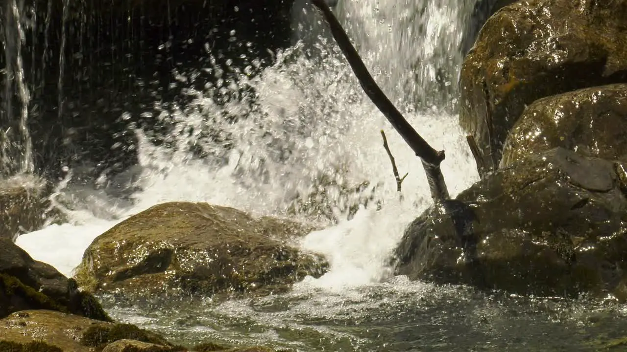 Water splashing onto rocks in a stream in Pyrenees Spain