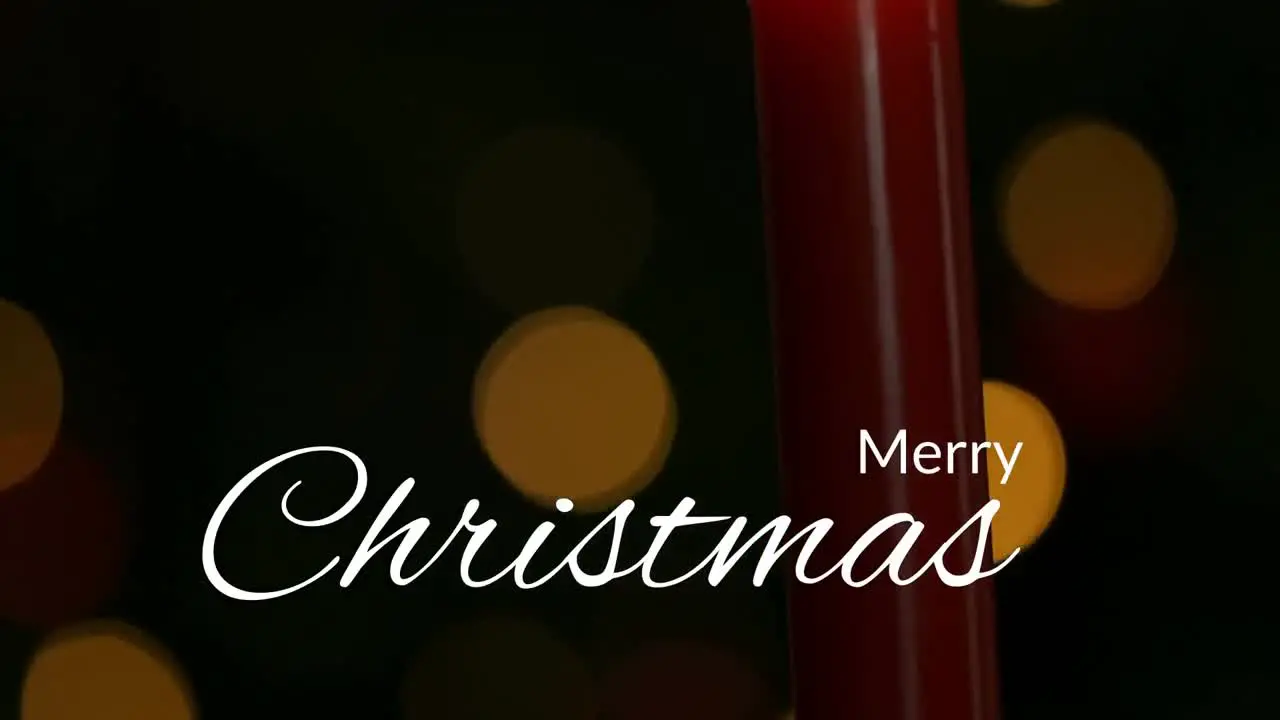 Merry Christmas text and burning candle 4k