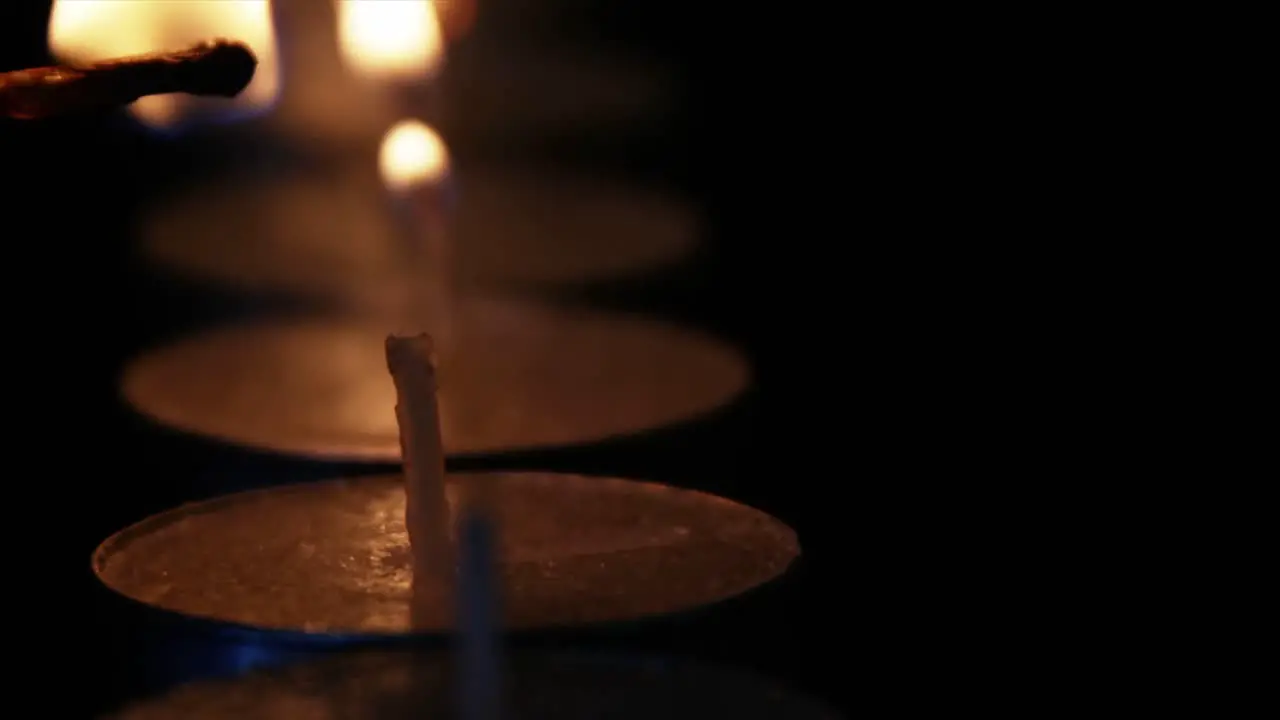 Lighting up candle with match stick