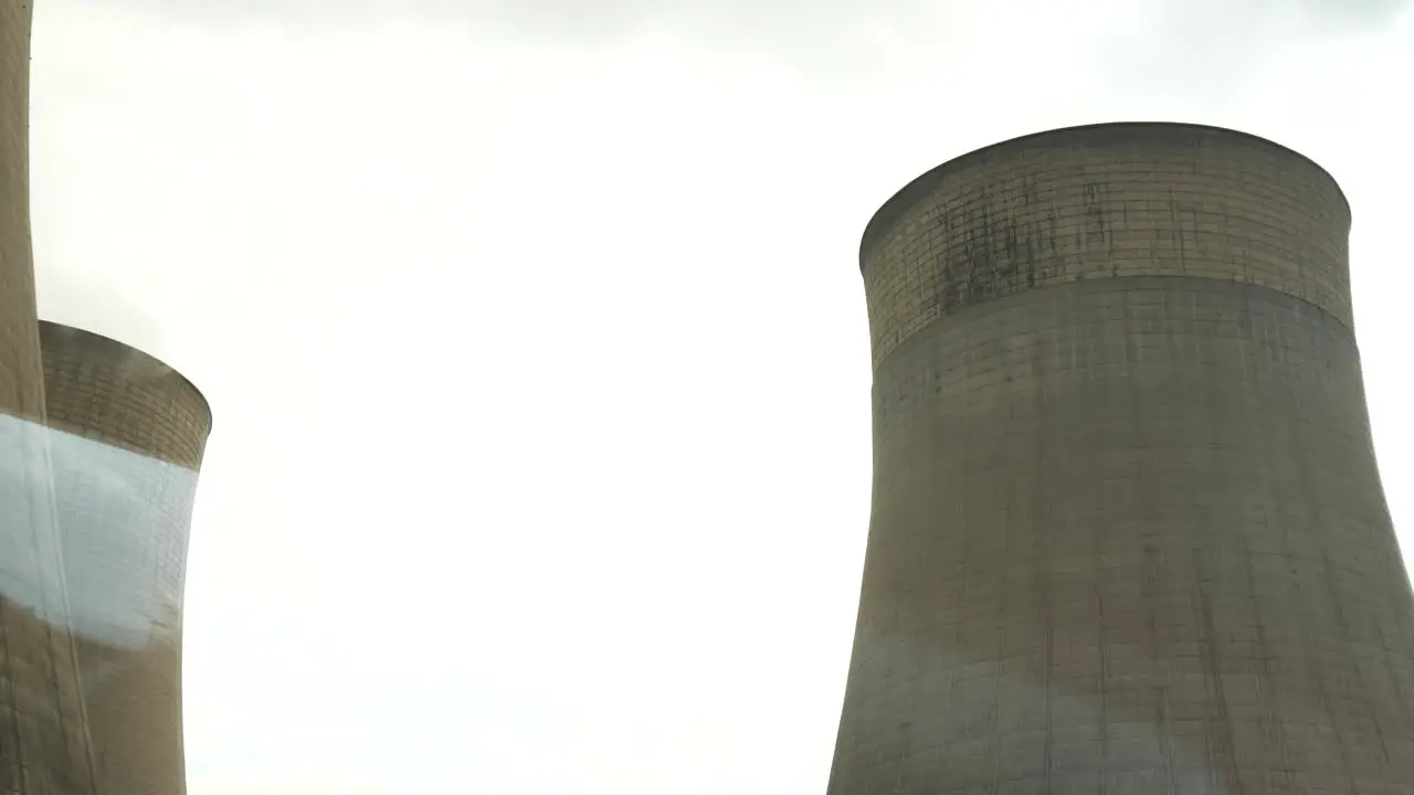 Driving past large condensing towers at a coal fired power station