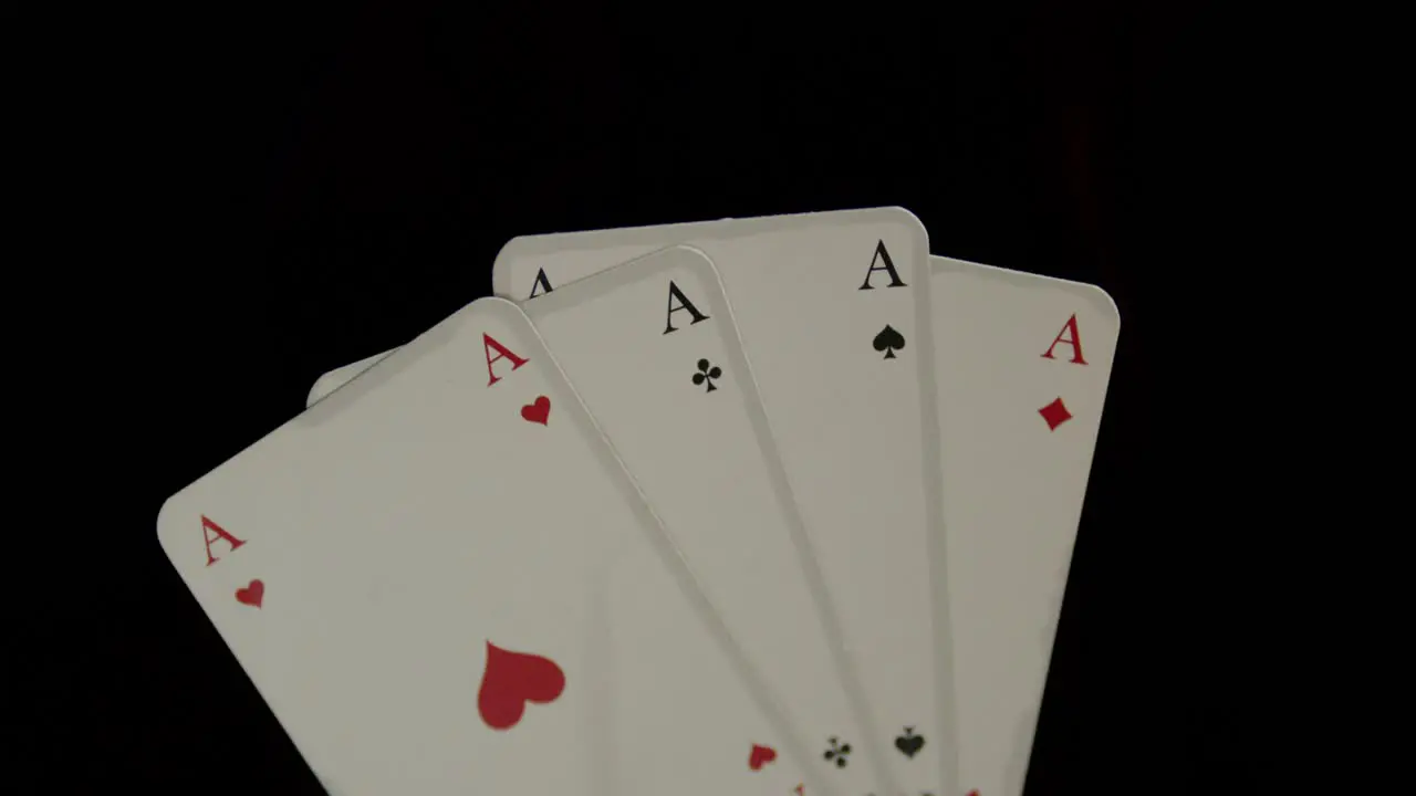 four playing cards are burned