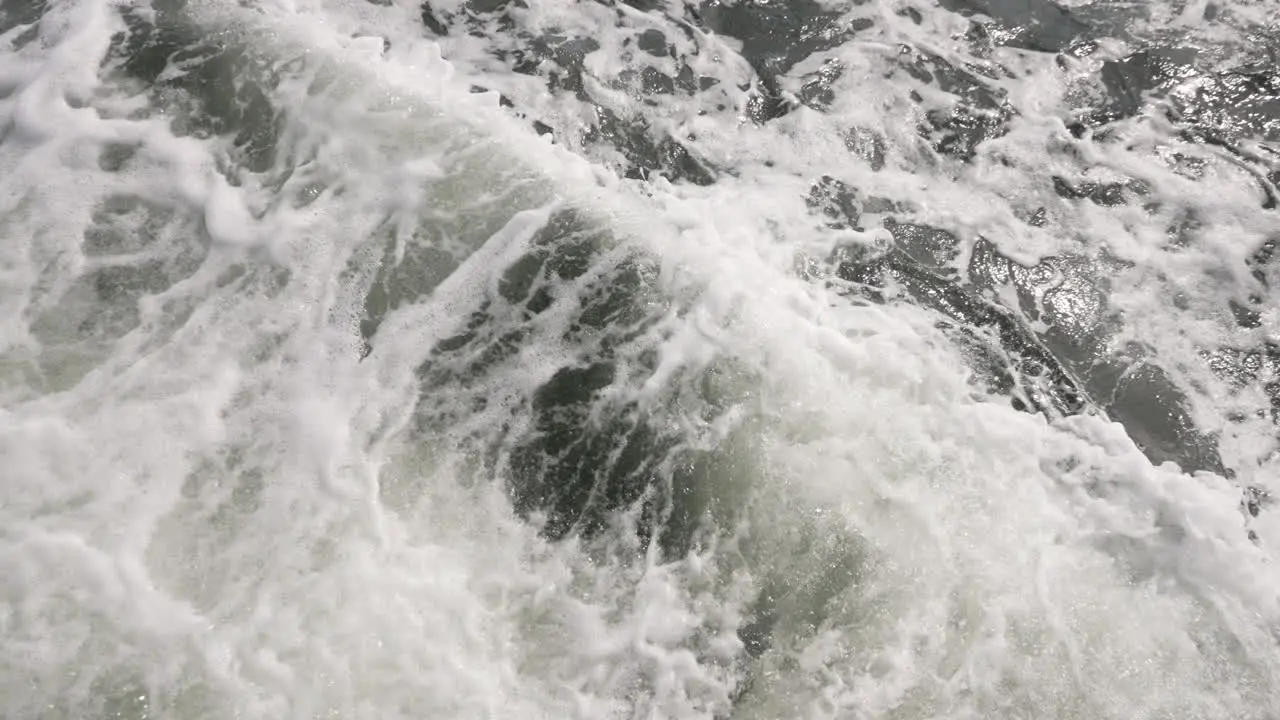 Waves from the wake of a boat slow motion