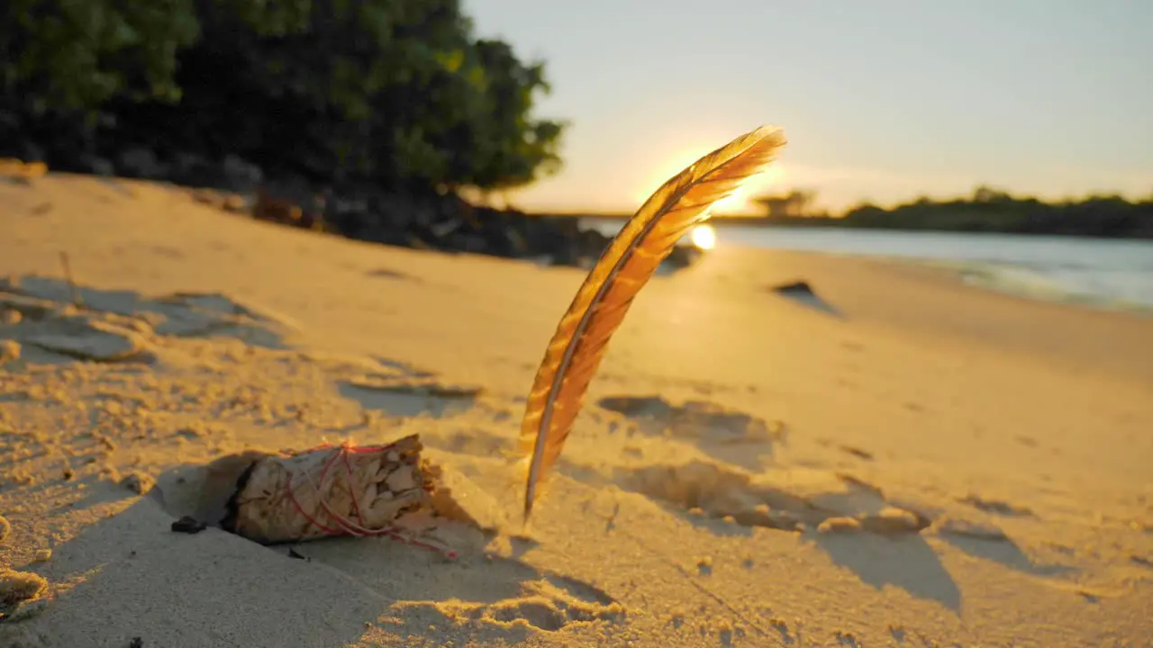 Smoke Coming Out From Burning Sage With Feather On Beach Sand At Sunset Smudge Kit