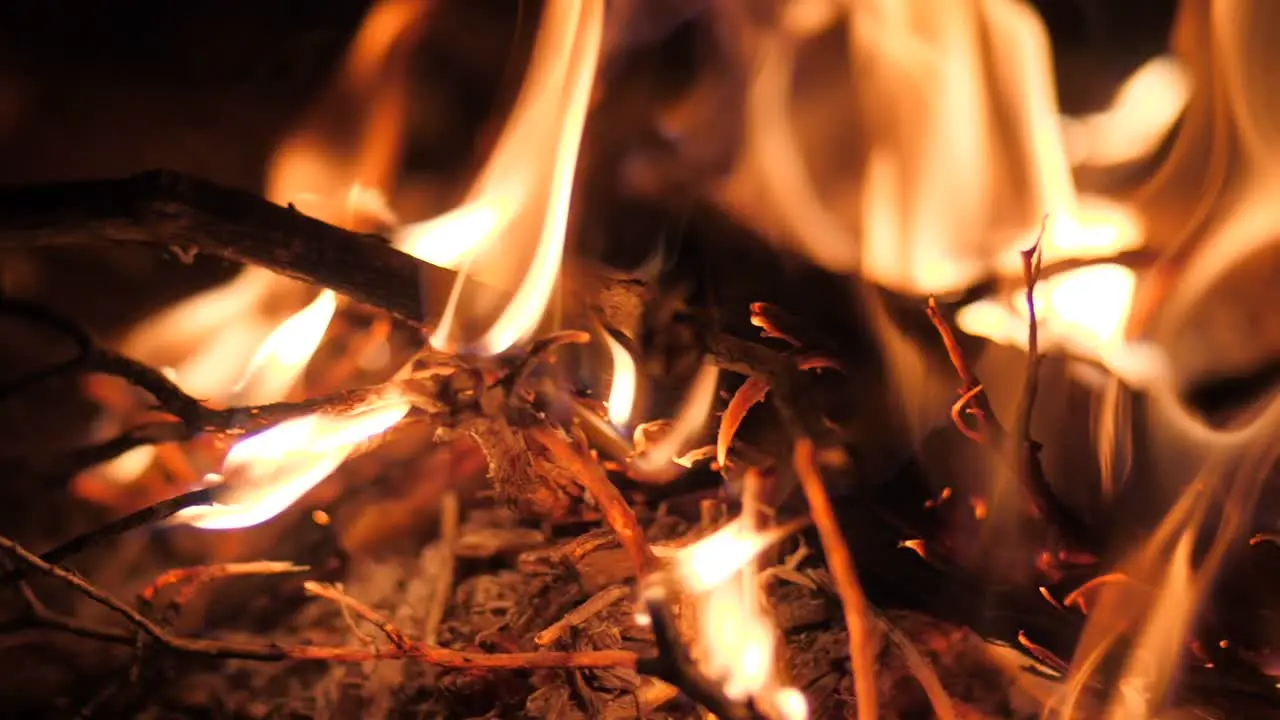 Cinematic shot of burning Log Fire Flames in Fireplace Close-up Slow Motion