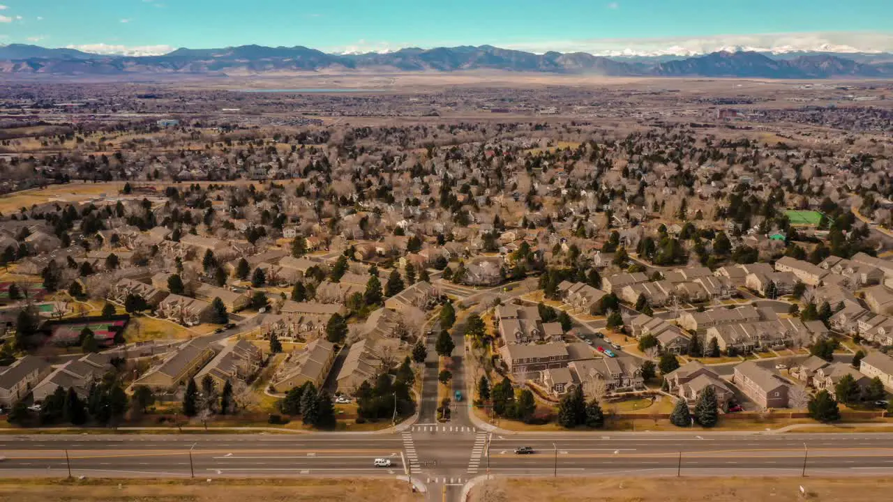 Aerial time-lapse show Colorado neighborhood as the clouds move in