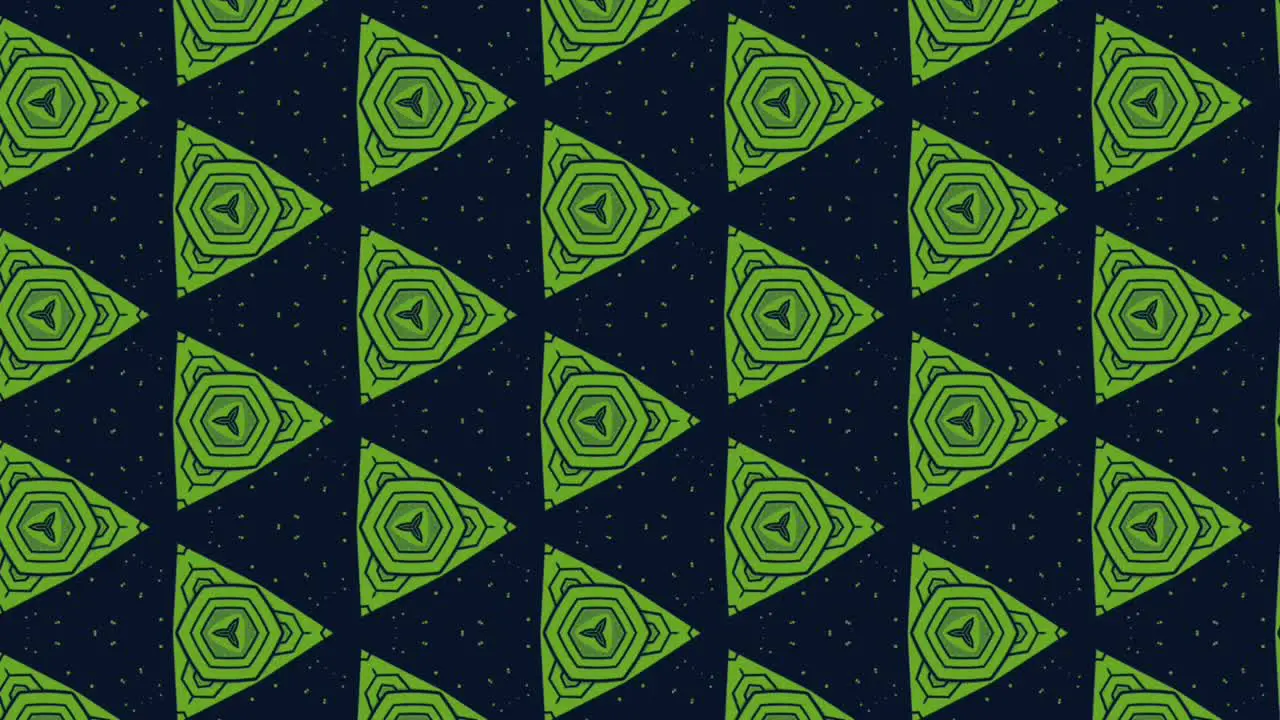 Graphic effect with triangles in dark blue and green moving vertically