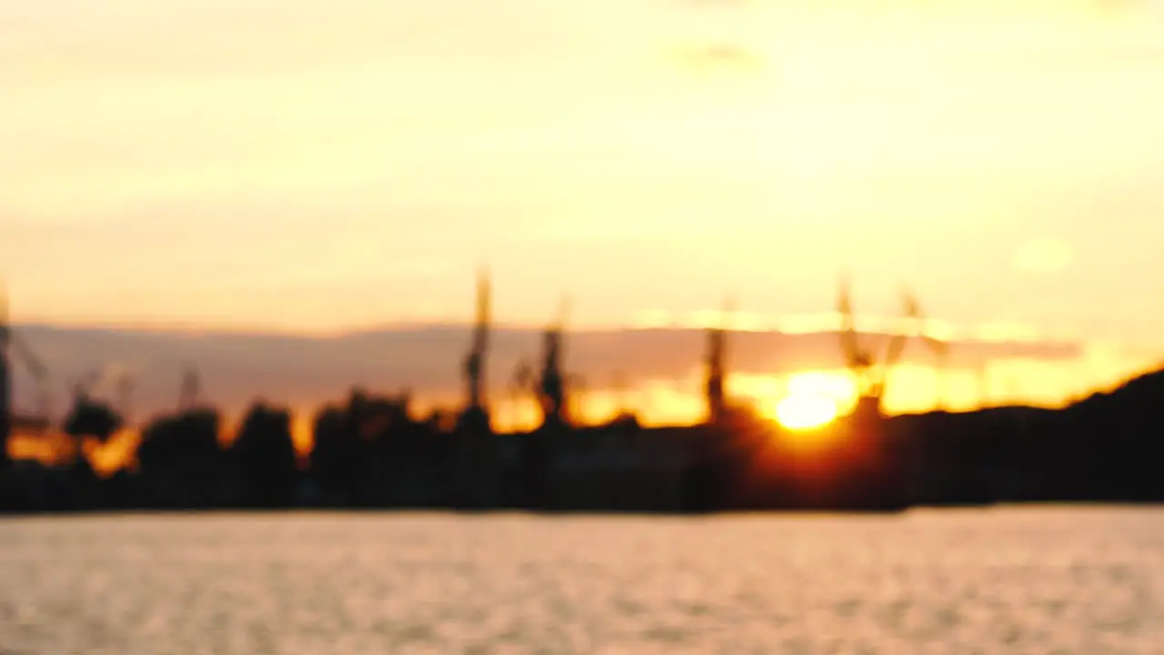 Blurred view of shipyard at sunset