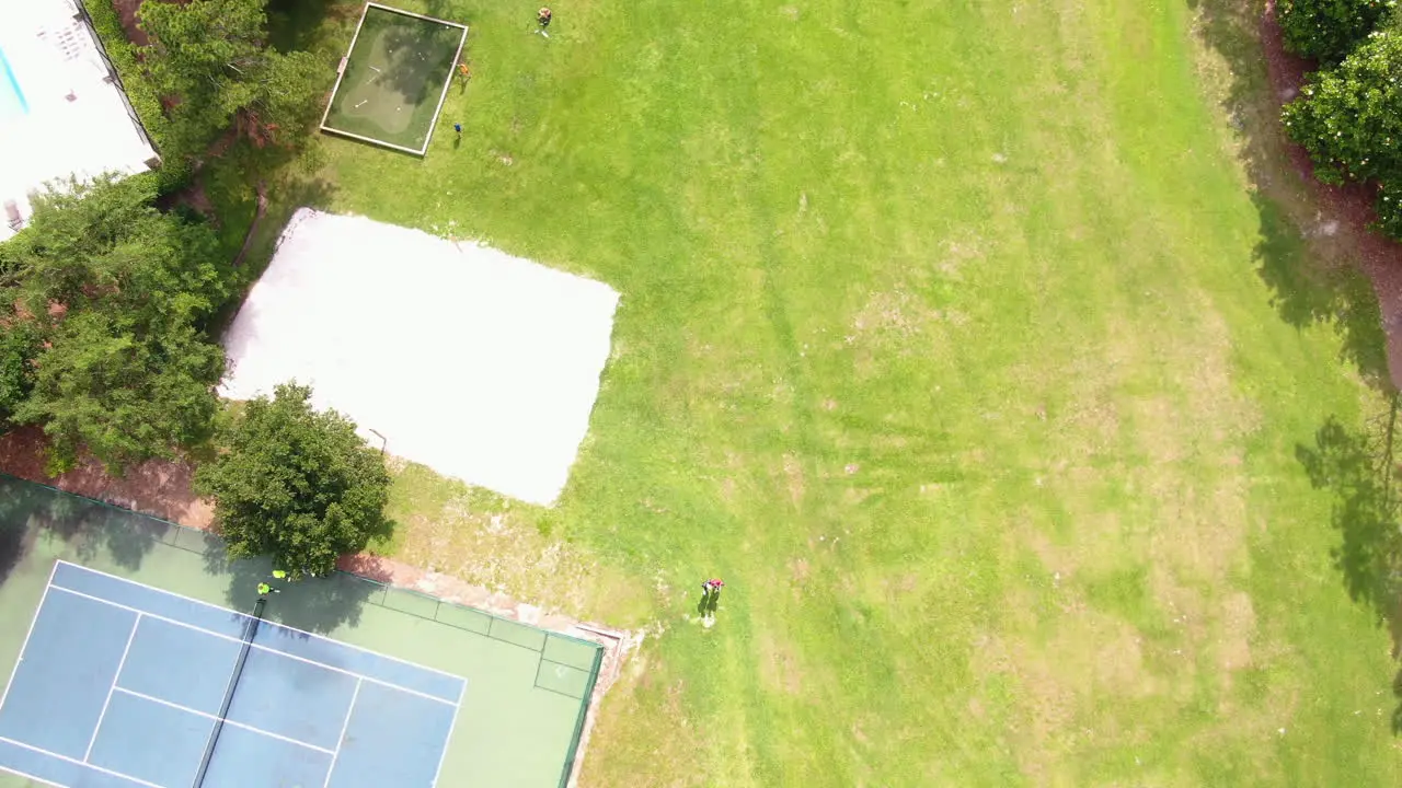 Flying out over beautiful neighborhood park