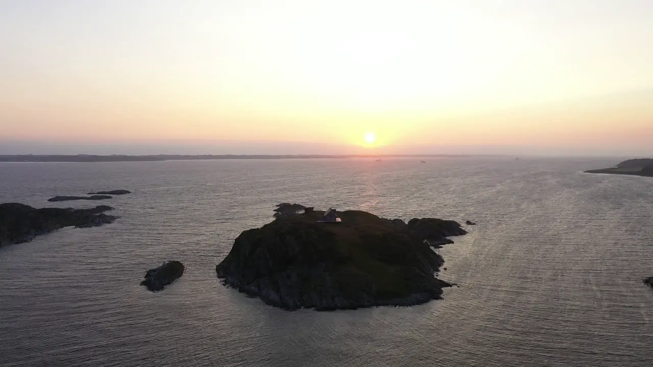 Isolated house on tiny island on the Norwegian coast outside Bergen