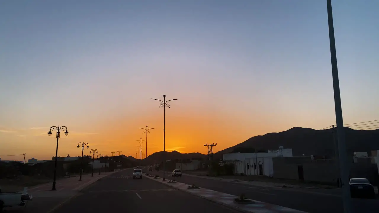 Driving at Sunset Time  Al Ula Hills In Background Saudi Arabia