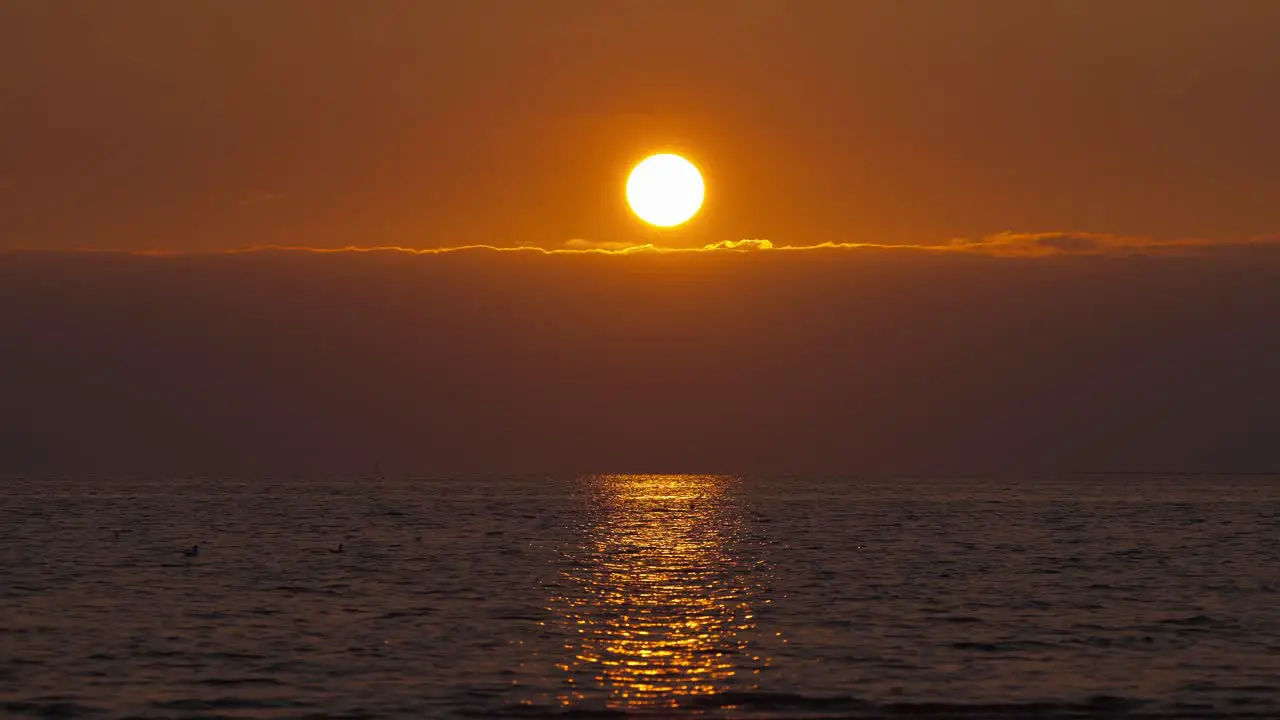 Sunset over the ocean sea ripple windy wavy water calm peaceful state of mind