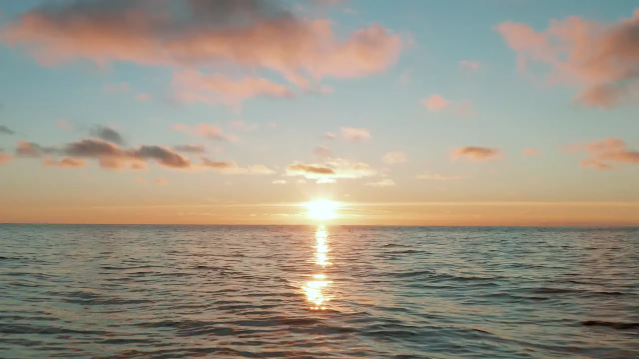 Drone flying over calm wavy sea