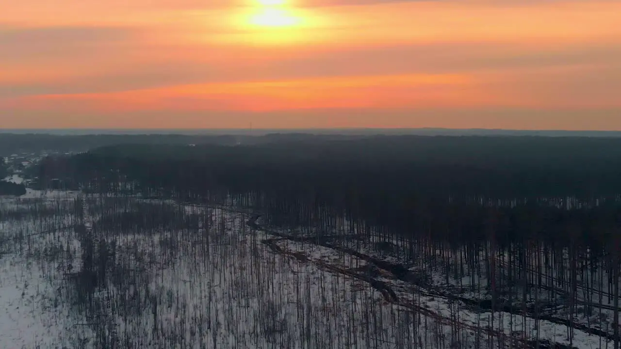 Overview Shot Of Wide Snowy Swamp At Sunset Time Colorful Sky USA