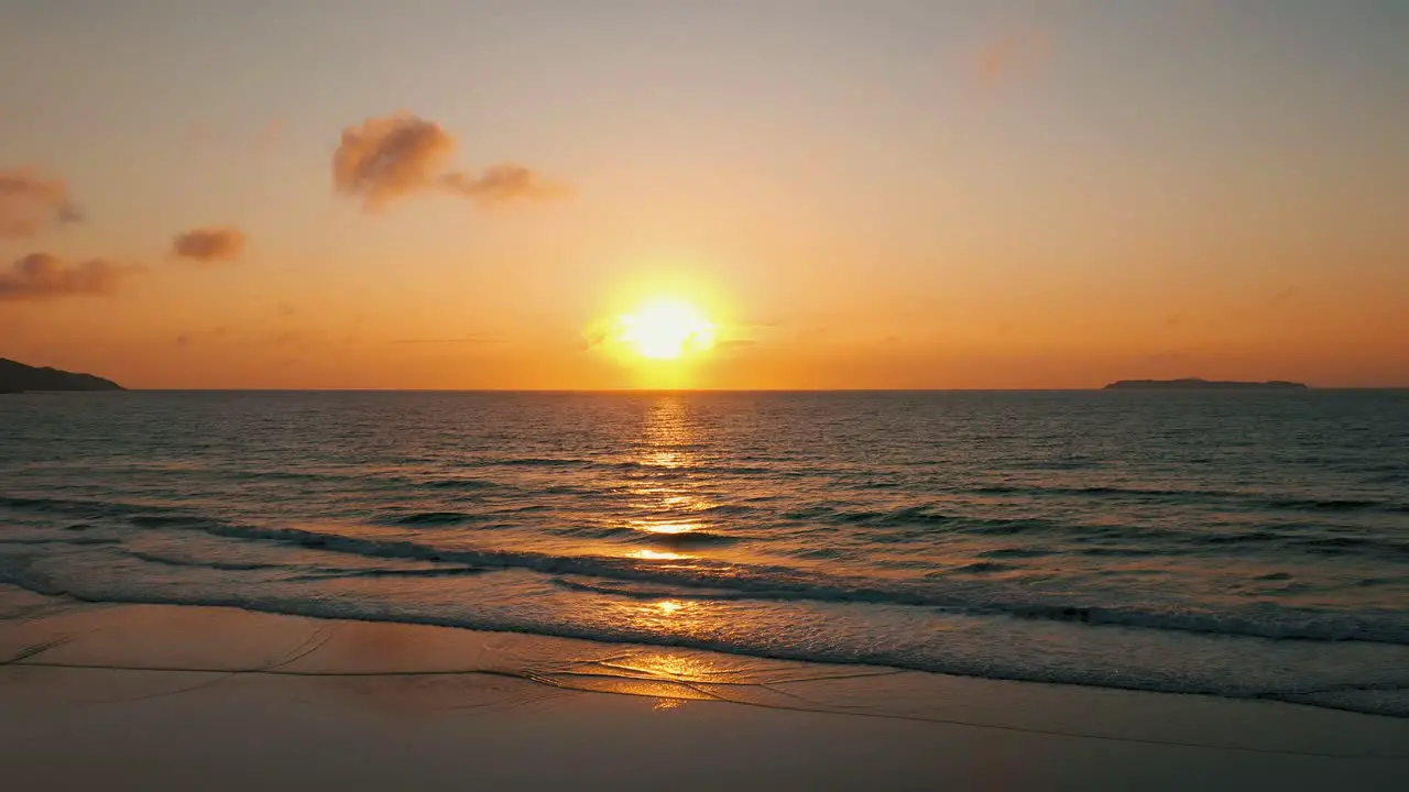 Drone aerial view over stunning beach sunrise South America Santa Catarina Brazil