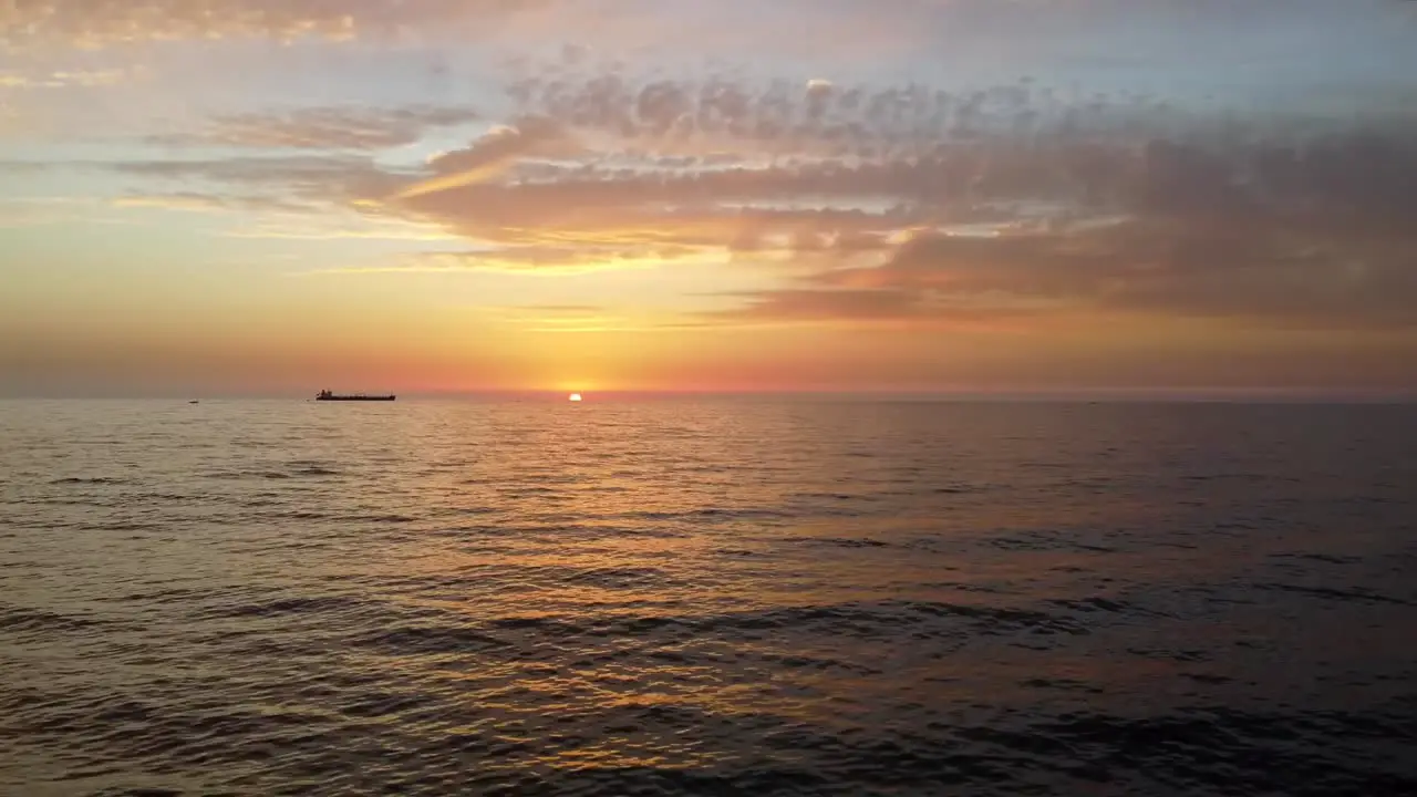 Beautiful fiery sun sinking in the horizon in batroun Lebanon -Aerial