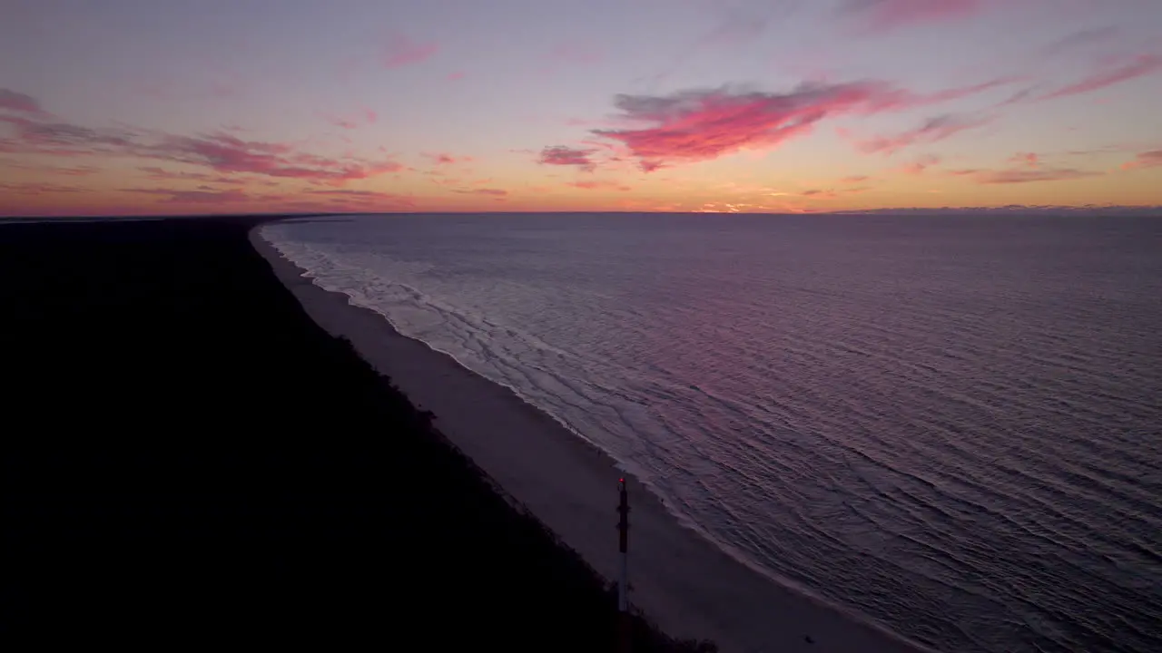 Aerial View Of Orange Sunset Skies Over Beach Of Krynica Morska Poland