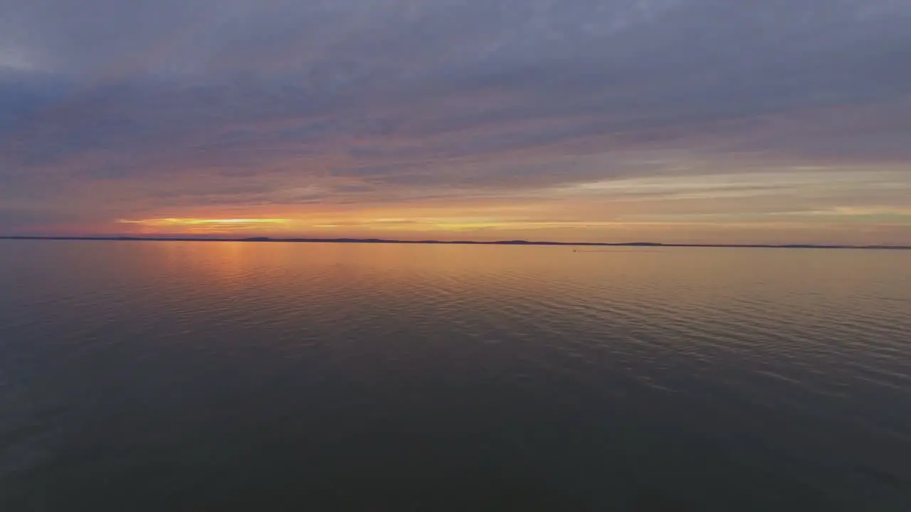 One Yacht Far in the Curonian Lagoon at Sunset