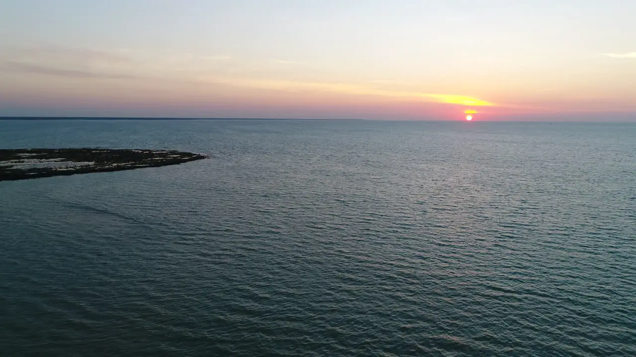 Aerial shot of Sunset over beach