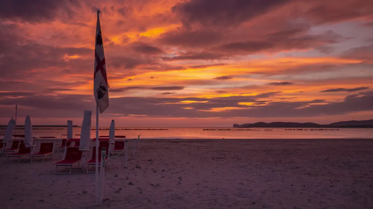 Breathtaking timelapse by the beach during golden hour in the sunset in Alghero Sardinia Italy