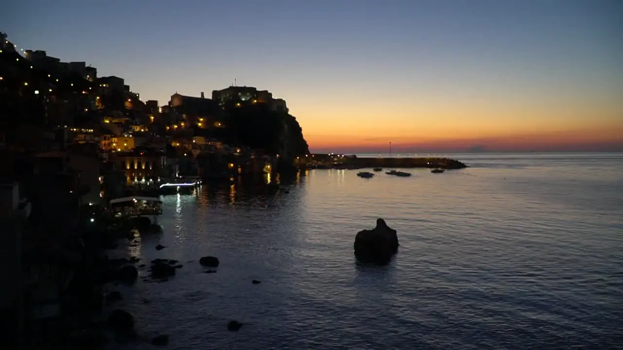 Italian coastal horizon sunset spectrum of colors gradient sky with blue yellow and orange colors seascape