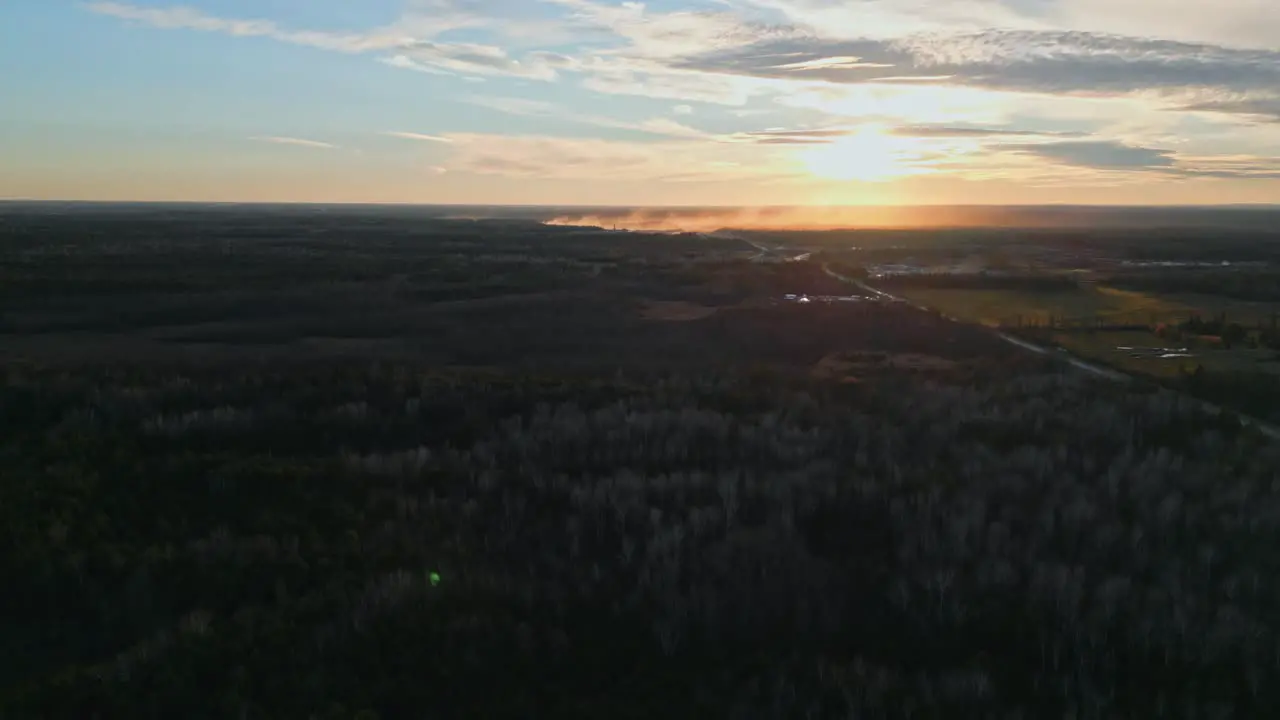 Scenic cinematic valley and dusty fields near Ottava Canada During sunset