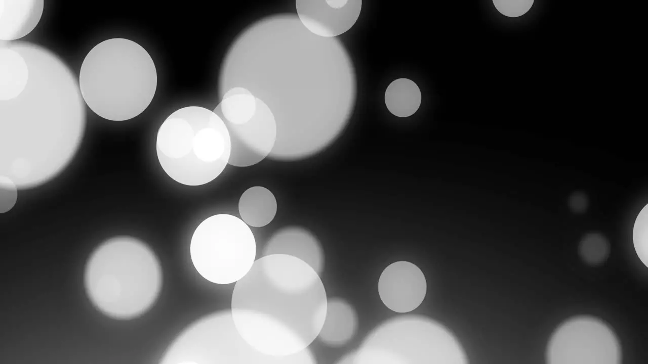 Animation of moving white spots on black background