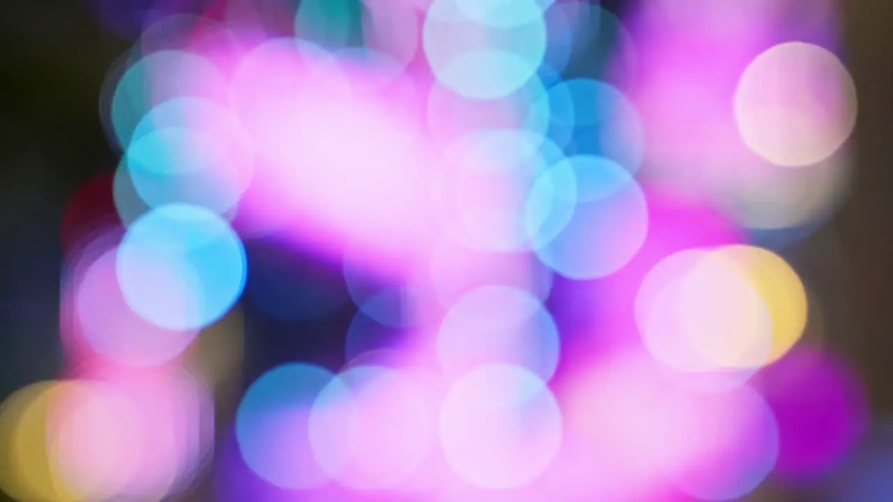 Colorful blurred bokeh of LED lights at a music concert