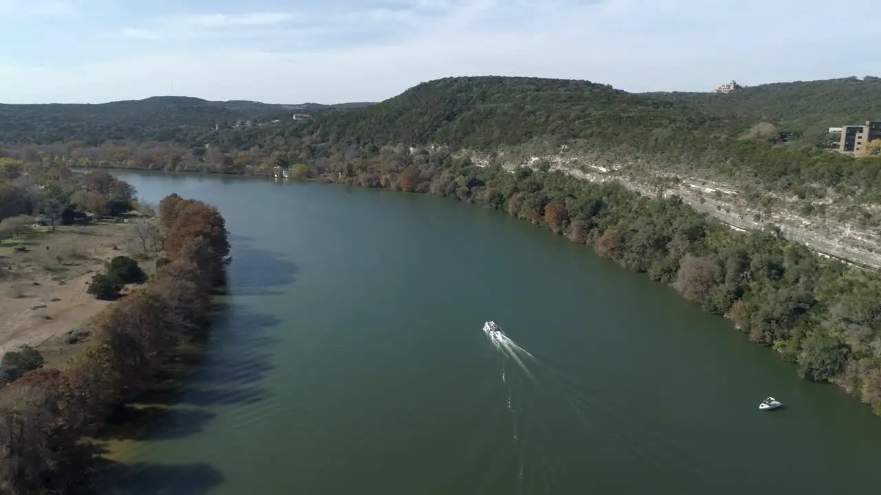 This video is about an aerial view of Lake Austin on a sunny day in Austin Texas