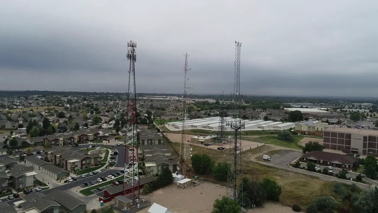 Radio towers shot by drone during an ominous cloudy storm