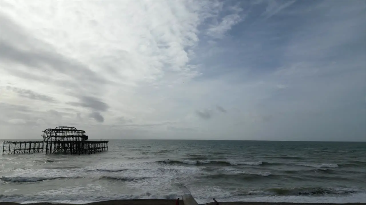 Stormy English Channel view from Brighton beach infrastructure scorched by the sea