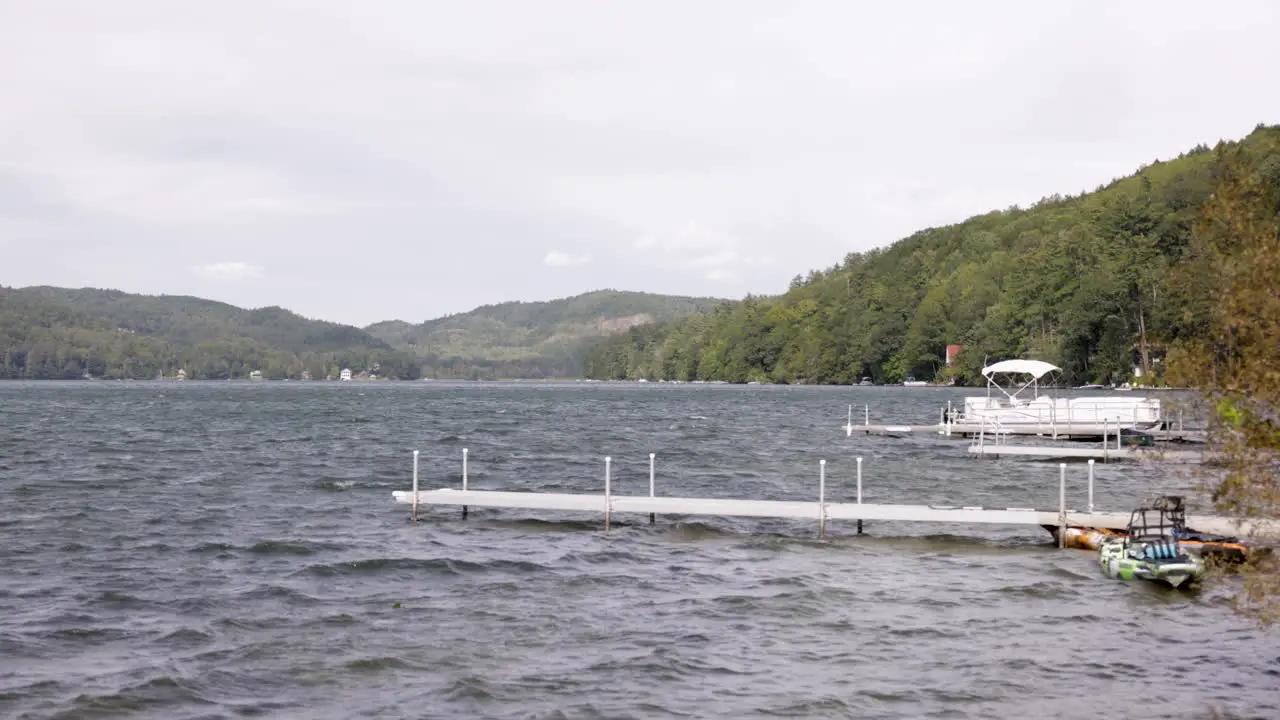 Boat Dock on a Windy Lake in Vermont Surrounded by Trees