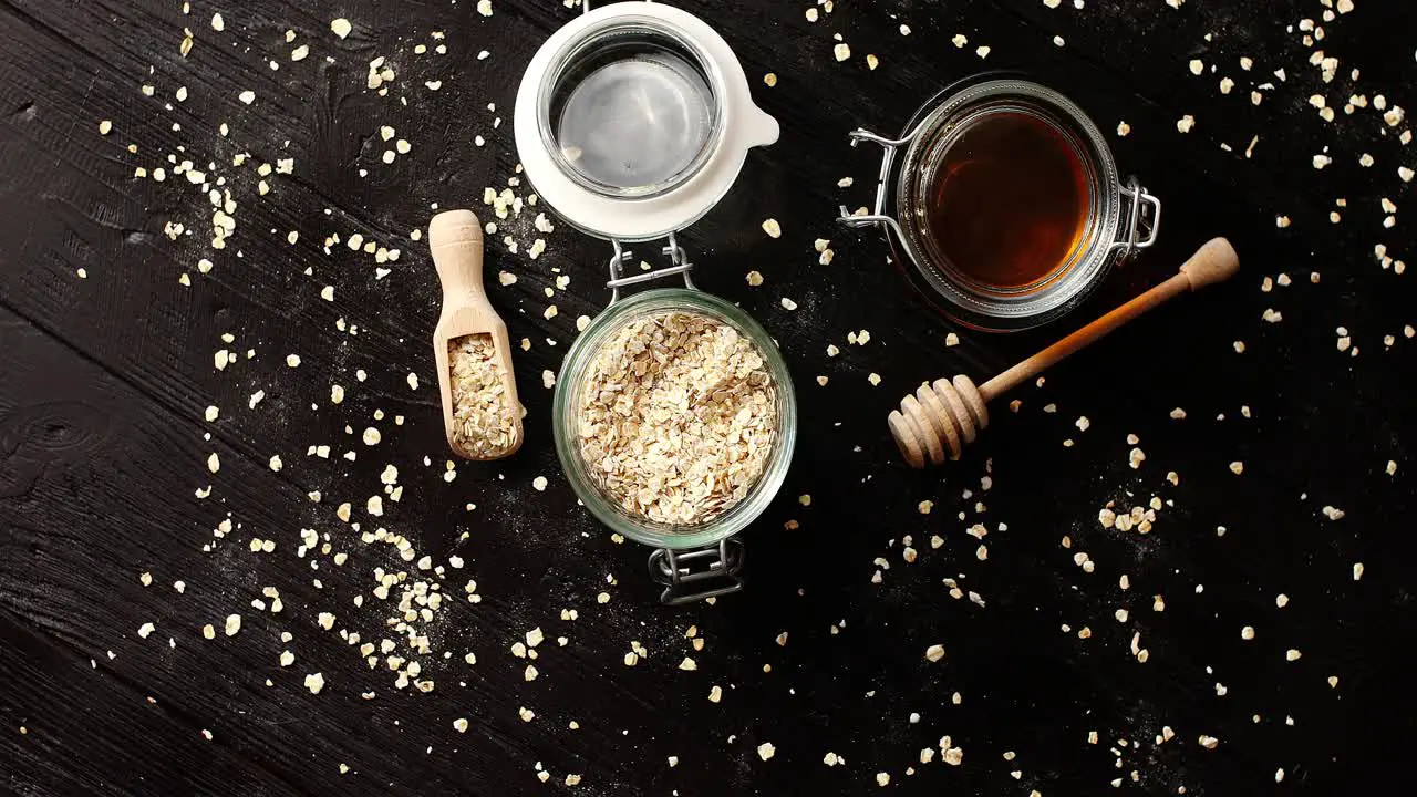 Oat in glass jar with honey