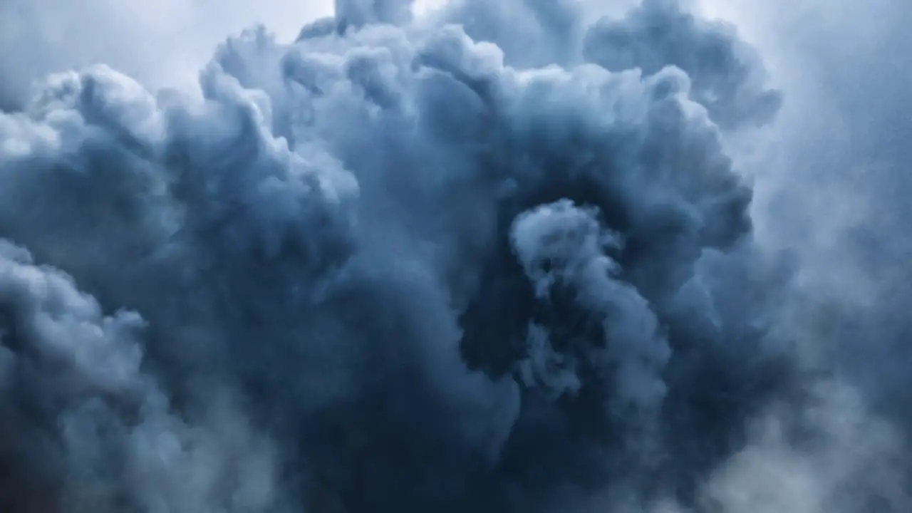 cumulus clouds in the dark sky with a thunderstorm inside