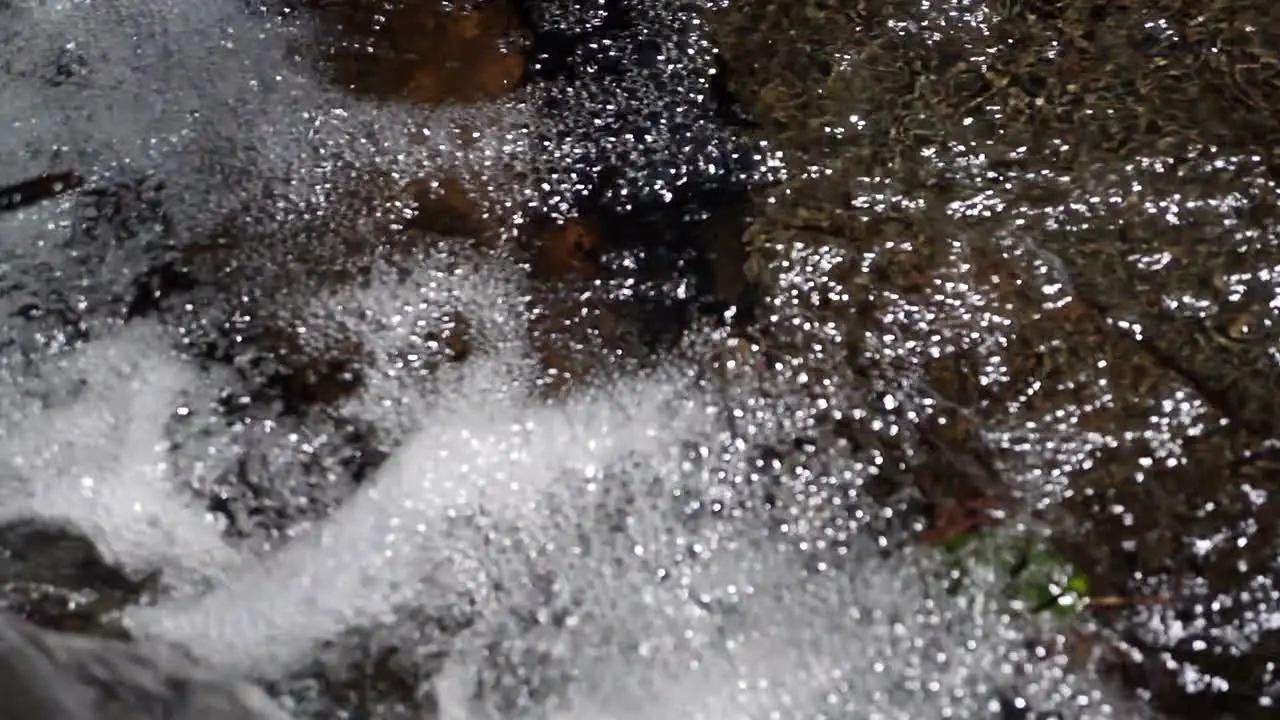 Bubbling water shot in mountain stream at 180 fps slow motion