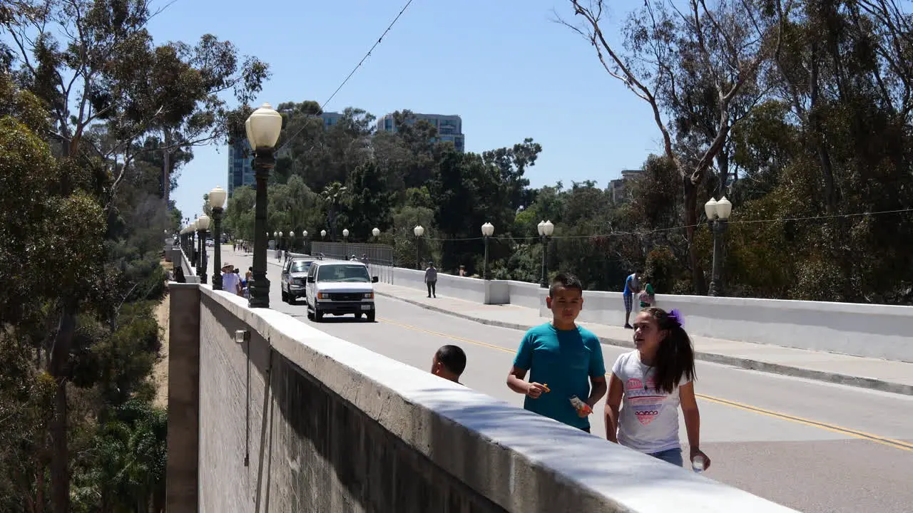 California Family Walking On Sidewalk