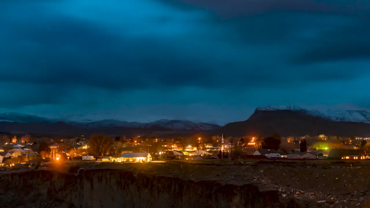 Twilight to nightfall time lapse of small town La Verkin Utah zoom out time lapse