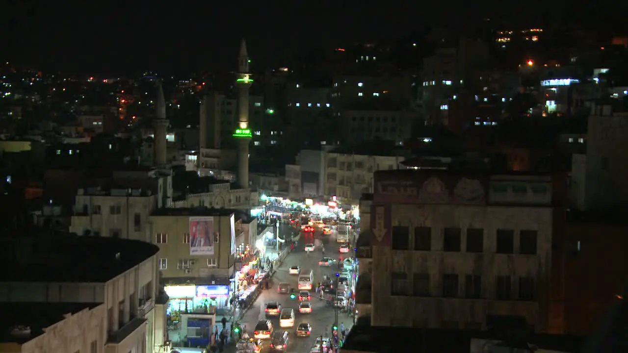 A high angle night view over traffic in downtown Amman Jordan 1